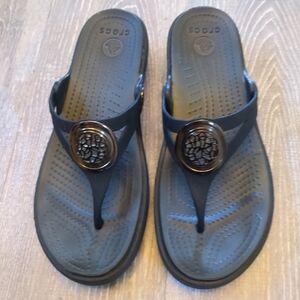 CROCS Black Thong Sandals with Decorative Medallion